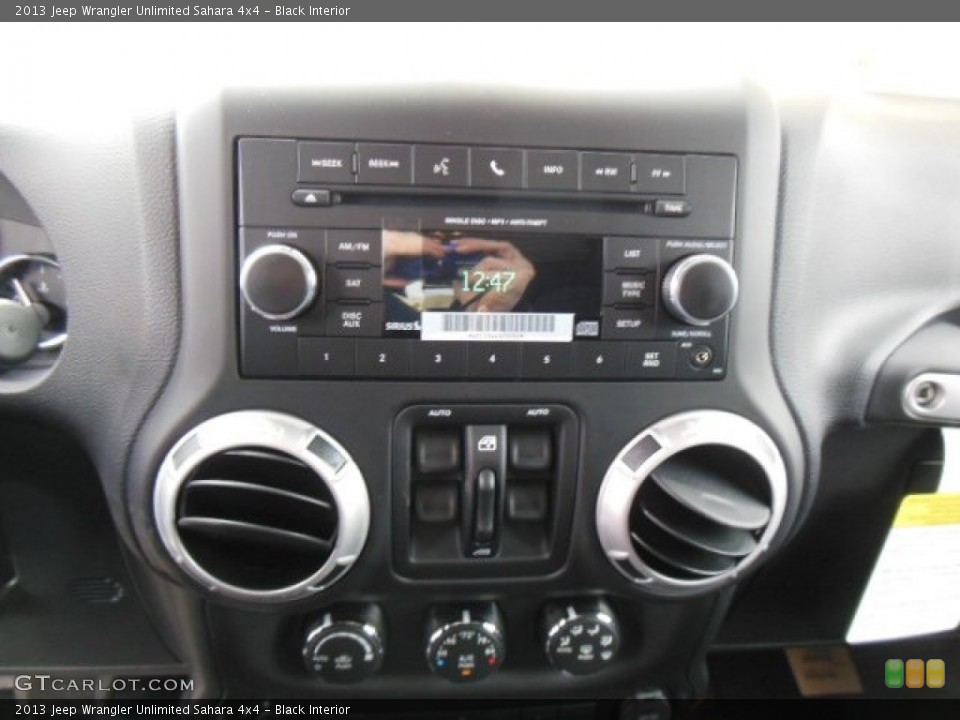 Black Interior Controls for the 2013 Jeep Wrangler Unlimited Sahara 4x4 #77123447