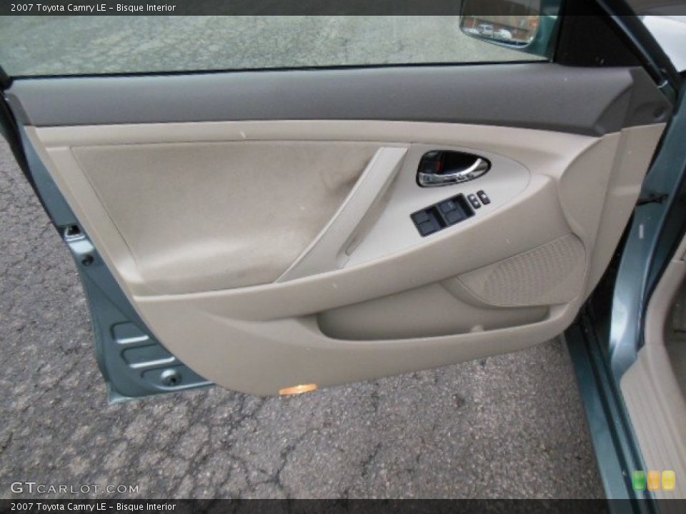 Bisque Interior Door Panel for the 2007 Toyota Camry LE #77128337