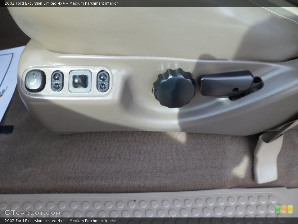 Medium Parchment Interior Controls for the 2002 Ford Excursion Limited 4x4 #77137117