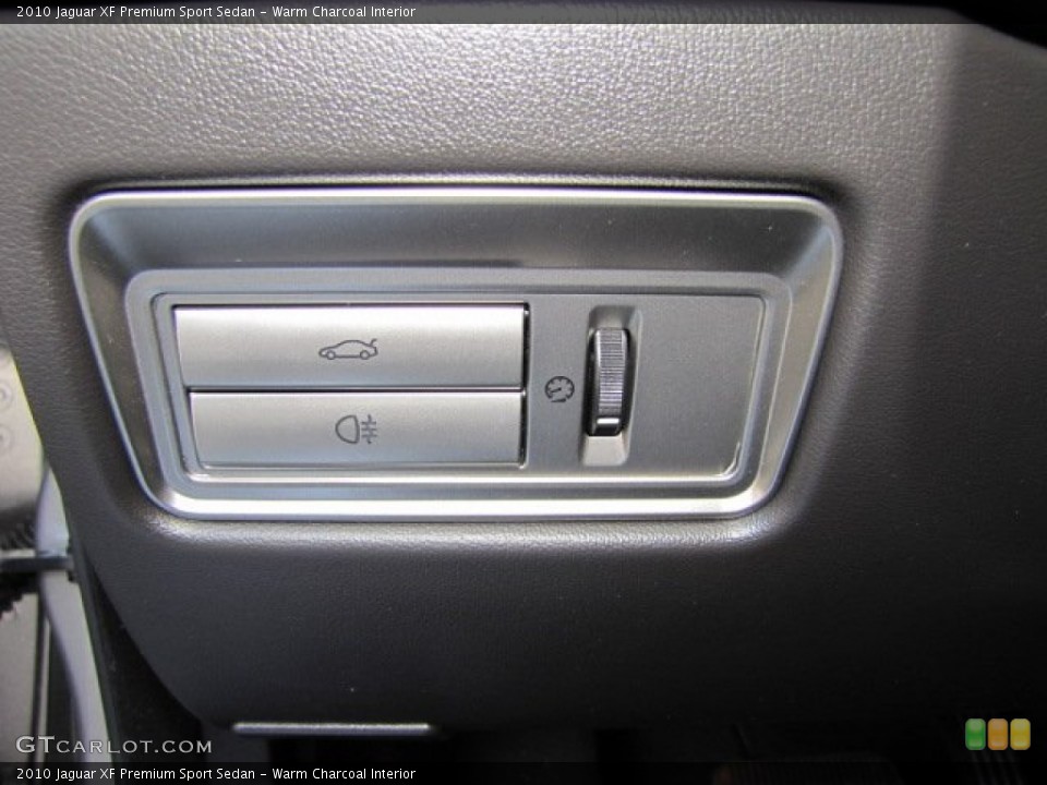 Warm Charcoal Interior Controls for the 2010 Jaguar XF Premium Sport Sedan #77168453