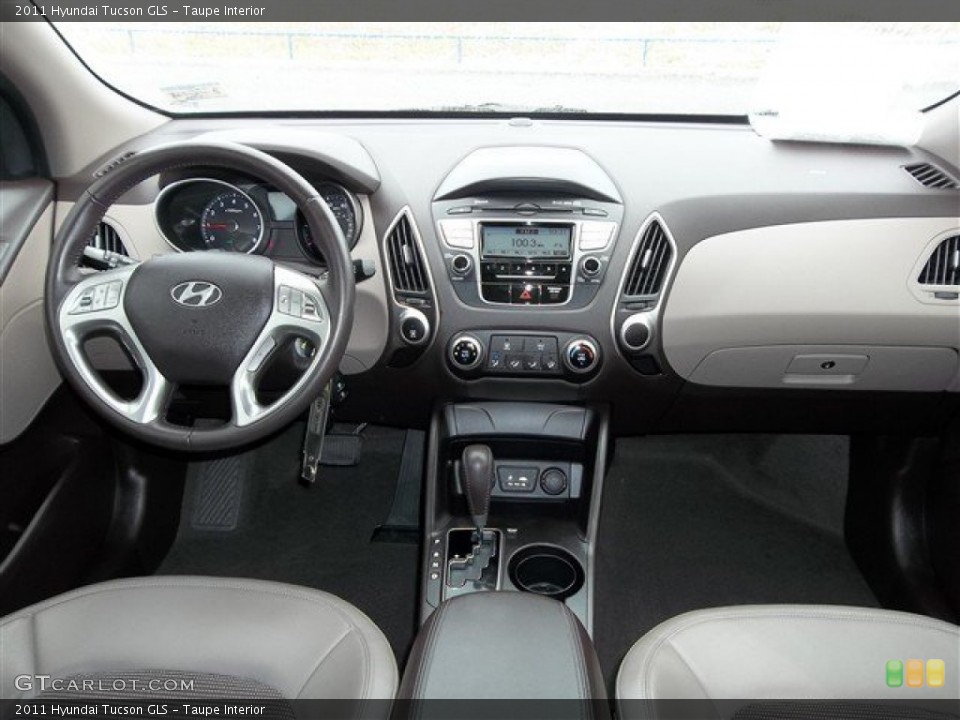 Taupe Interior Dashboard for the 2011 Hyundai Tucson GLS #77187612
