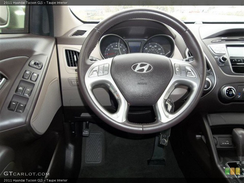Taupe Interior Steering Wheel for the 2011 Hyundai Tucson GLS #77187686