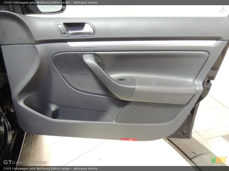 Anthracite Interior Door Panel for the 2009 Volkswagen Jetta Wolfsburg Edition Sedan #77201528