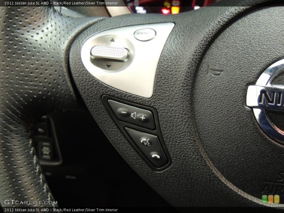 Black/Red Leather/Silver Trim Interior Controls for the 2012 Nissan Juke SL AWD #77210396
