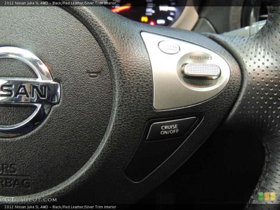 Black/Red Leather/Silver Trim Interior Controls for the 2012 Nissan Juke SL AWD #77210429