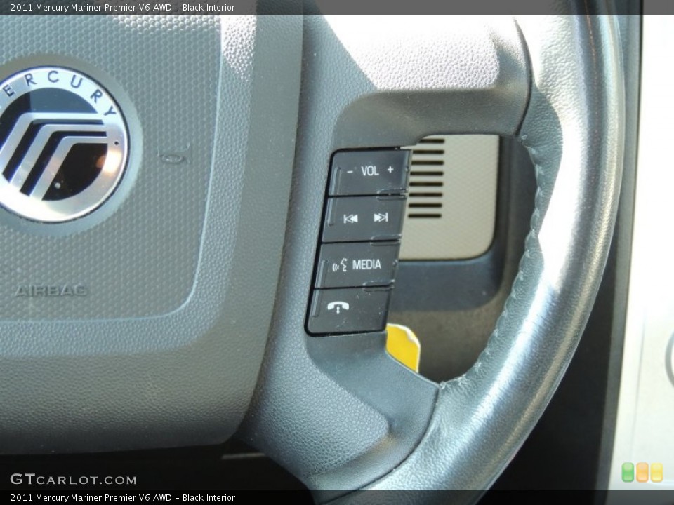 Black Interior Controls for the 2011 Mercury Mariner Premier V6 AWD #77230409