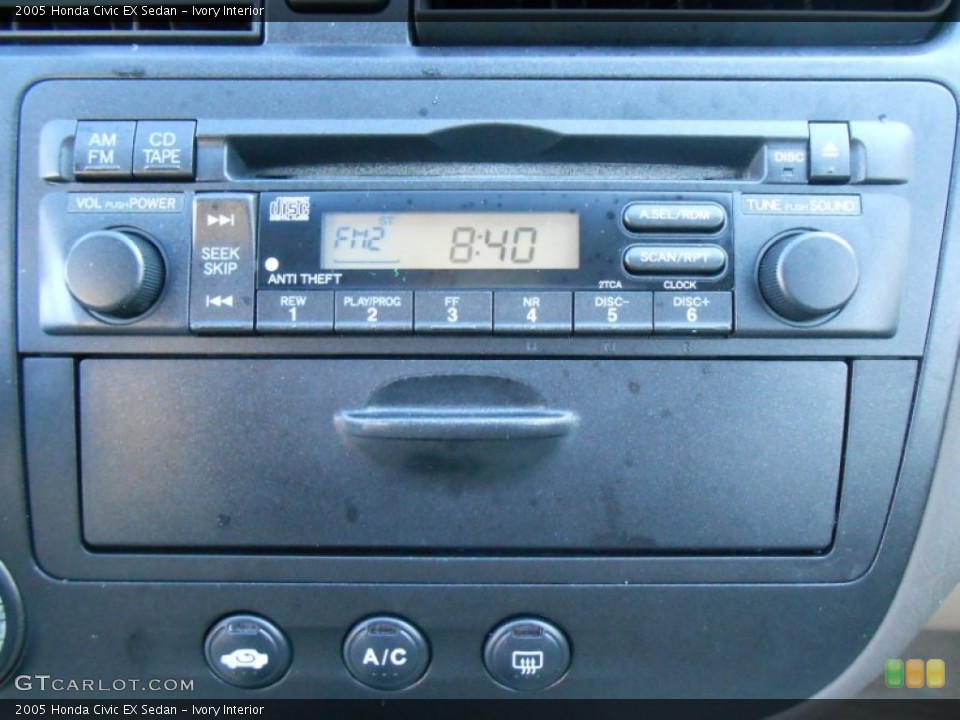 Ivory Interior Audio System for the 2005 Honda Civic EX Sedan #77245354