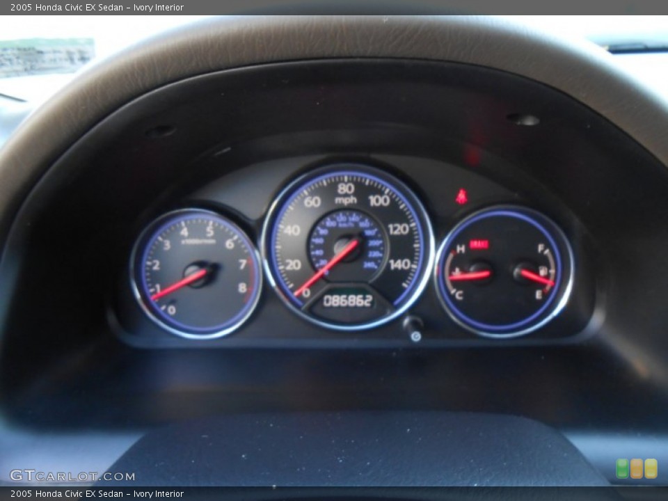 Ivory Interior Gauges for the 2005 Honda Civic EX Sedan #77245459