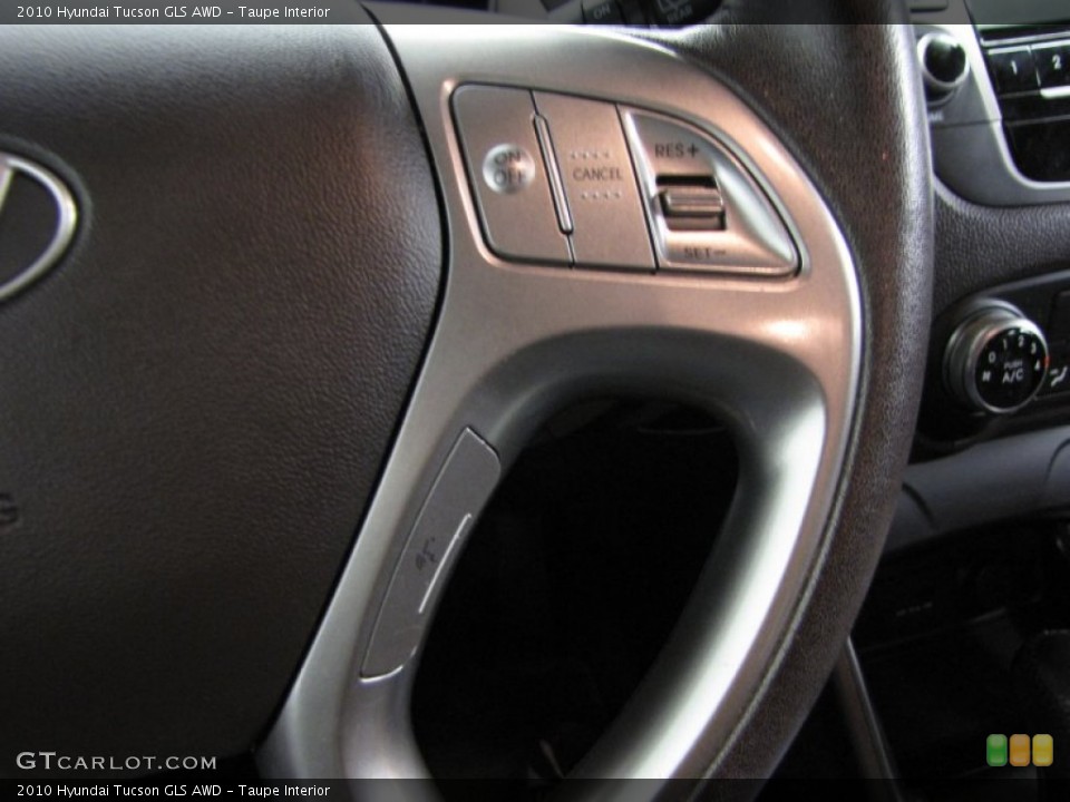 Taupe Interior Controls for the 2010 Hyundai Tucson GLS AWD #77250055