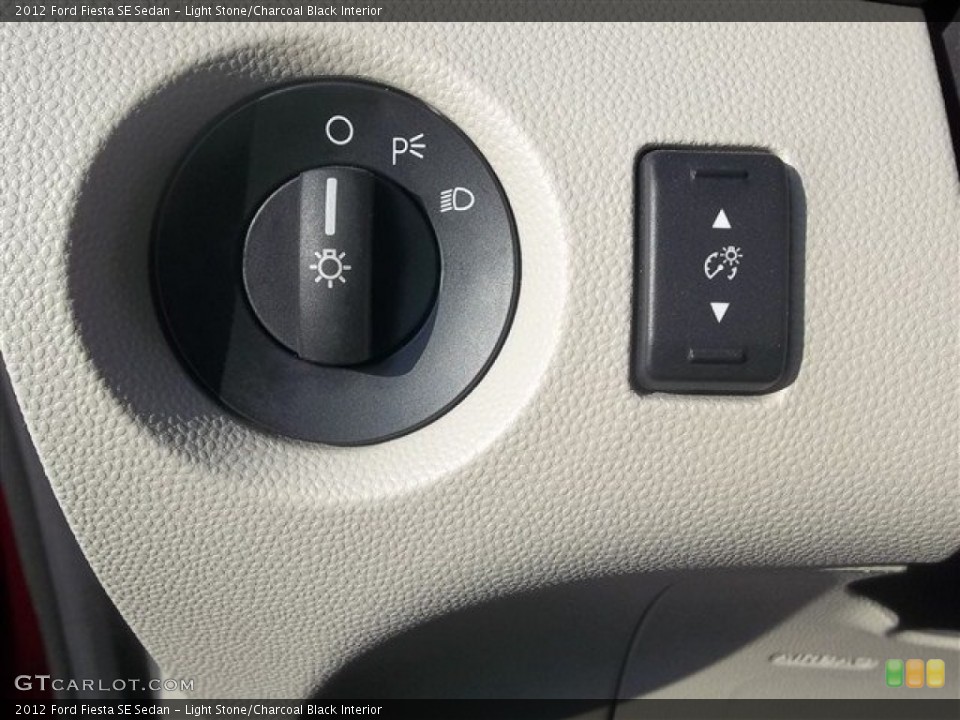 Light Stone/Charcoal Black Interior Controls for the 2012 Ford Fiesta SE Sedan #77253429
