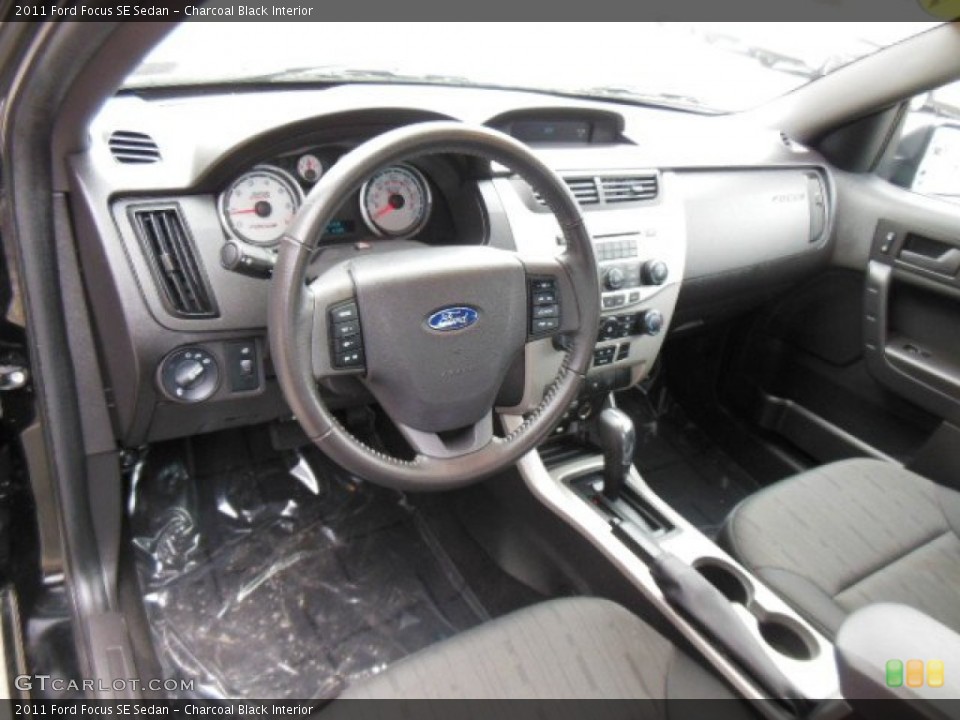 Charcoal Black Interior Prime Interior for the 2011 Ford Focus SE Sedan #77254373