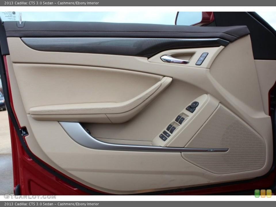 Cashmere/Ebony Interior Door Panel for the 2013 Cadillac CTS 3.0 Sedan #77267033