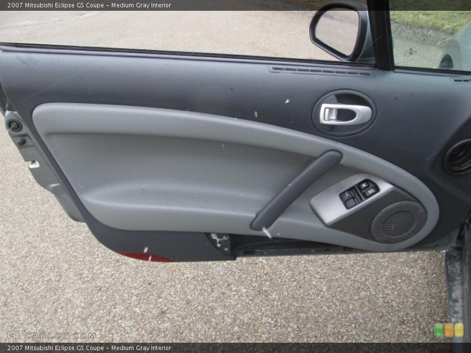 Medium Gray Interior Door Panel for the 2007 Mitsubishi Eclipse GS Coupe #77271209