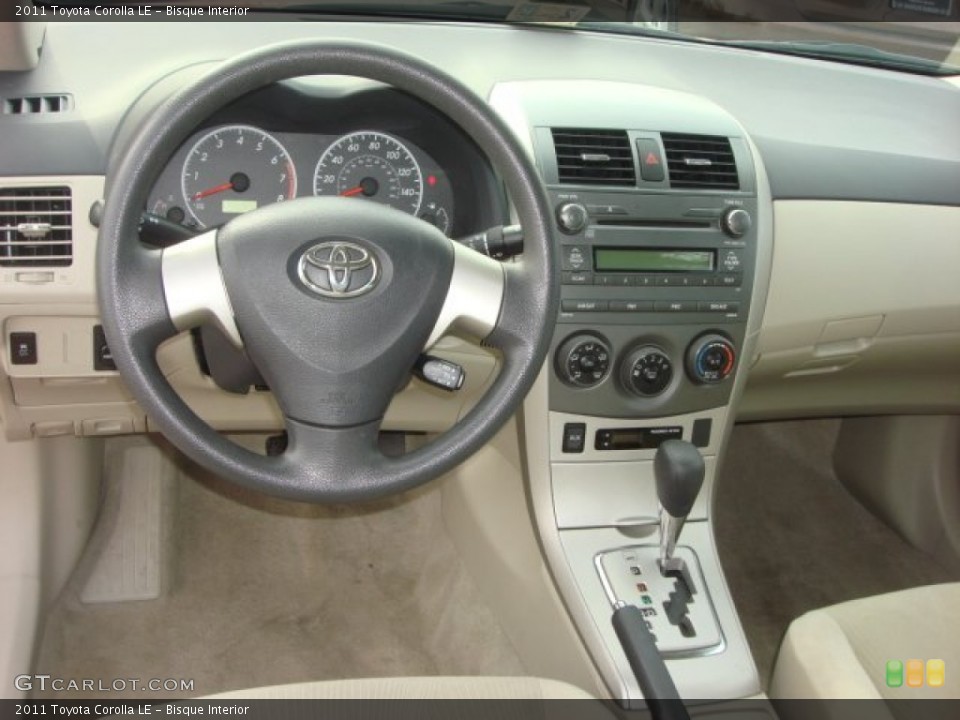 Bisque Interior Dashboard for the 2011 Toyota Corolla LE #77303437