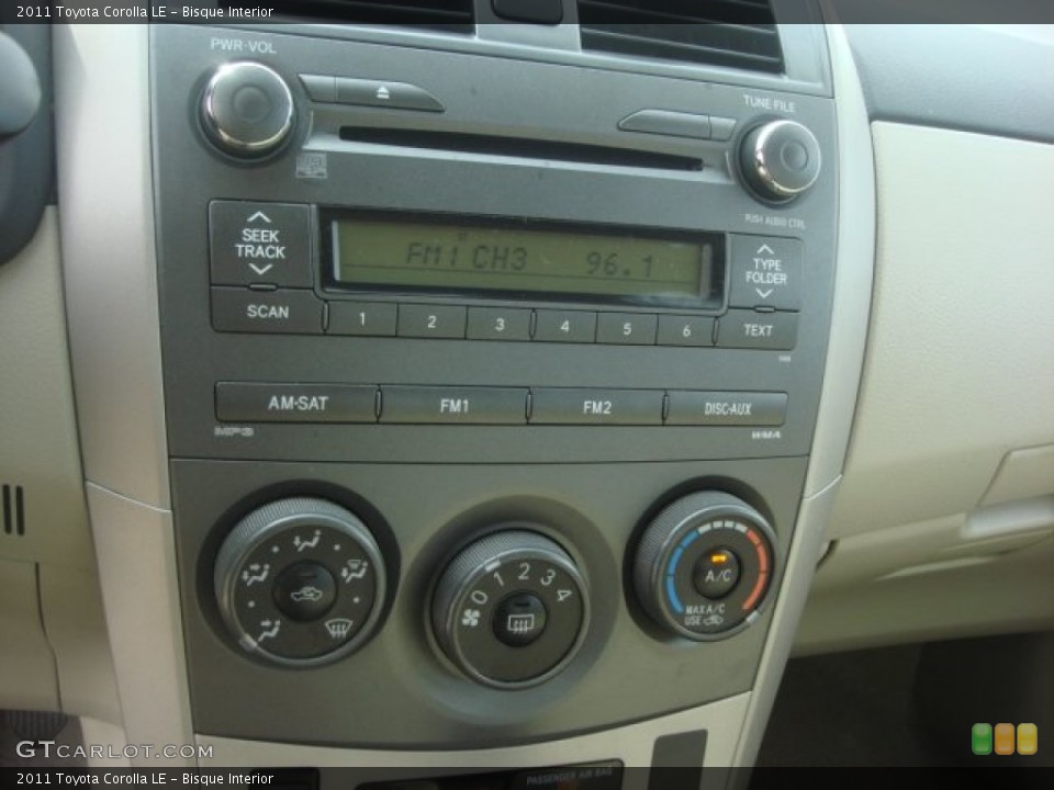 Bisque Interior Controls for the 2011 Toyota Corolla LE #77303550