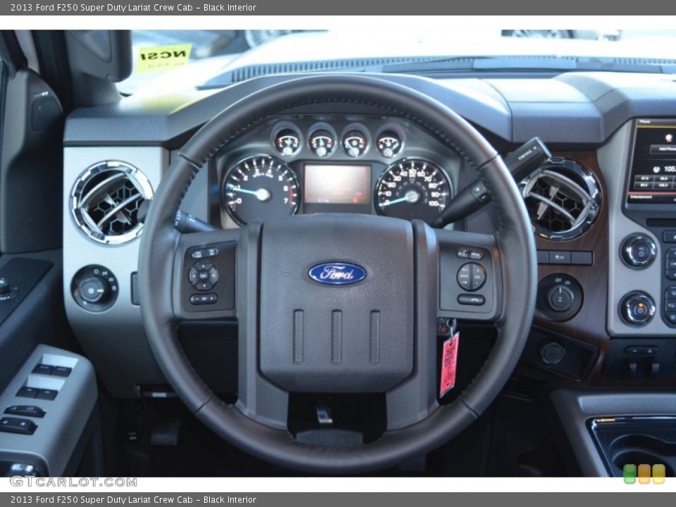 Black Interior Steering Wheel for the 2013 Ford F250 Super Duty Lariat Crew Cab #77303642