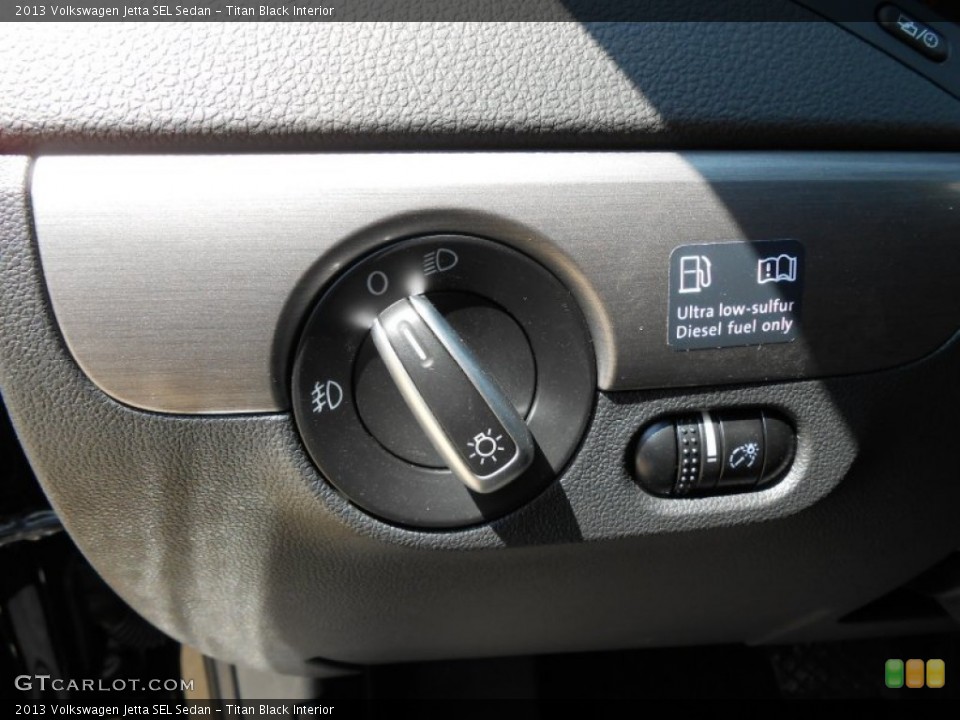 Titan Black Interior Controls for the 2013 Volkswagen Jetta SEL Sedan #77303874