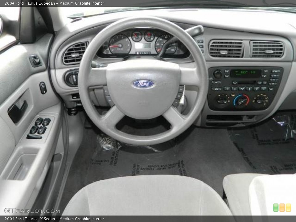 Medium Graphite Interior Dashboard for the 2004 Ford Taurus LX Sedan #77363282