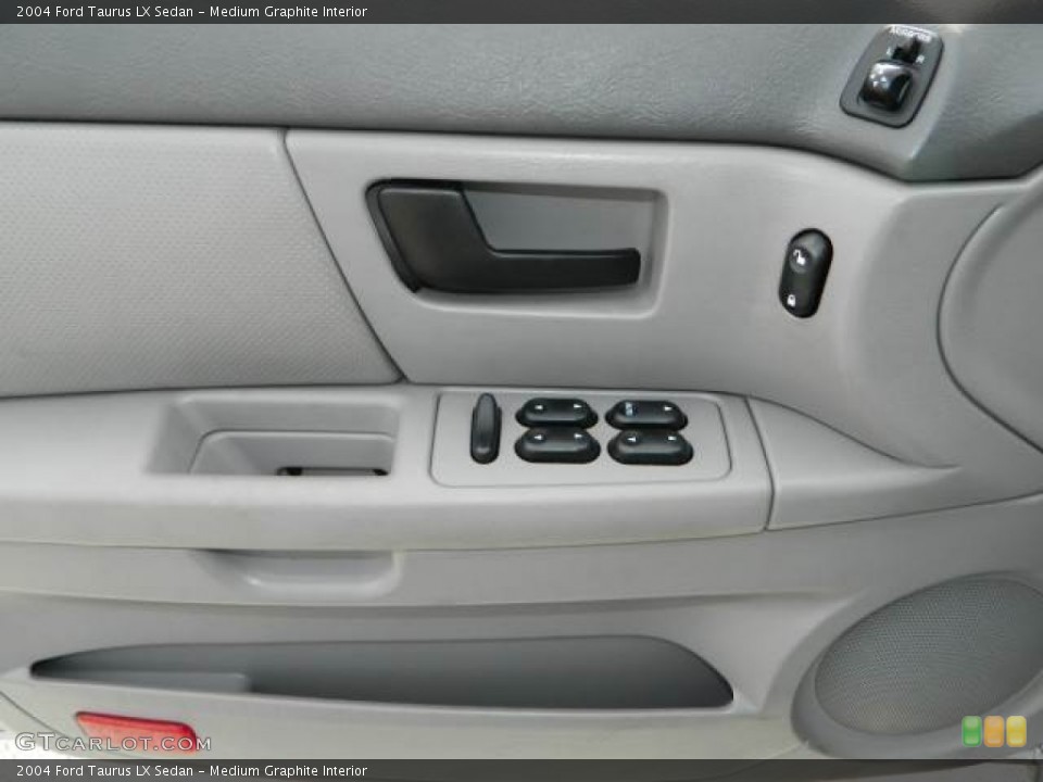 Medium Graphite Interior Controls for the 2004 Ford Taurus LX Sedan #77363394