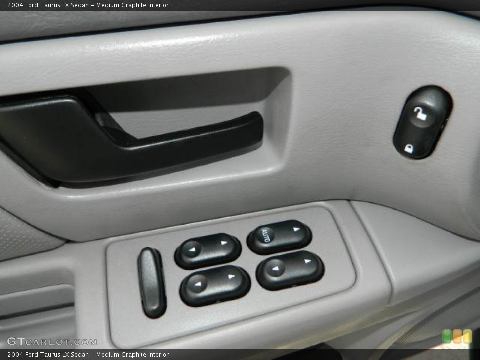 Medium Graphite Interior Controls for the 2004 Ford Taurus LX Sedan #77363403