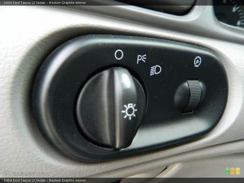 Medium Graphite Interior Controls for the 2004 Ford Taurus LX Sedan #77363485