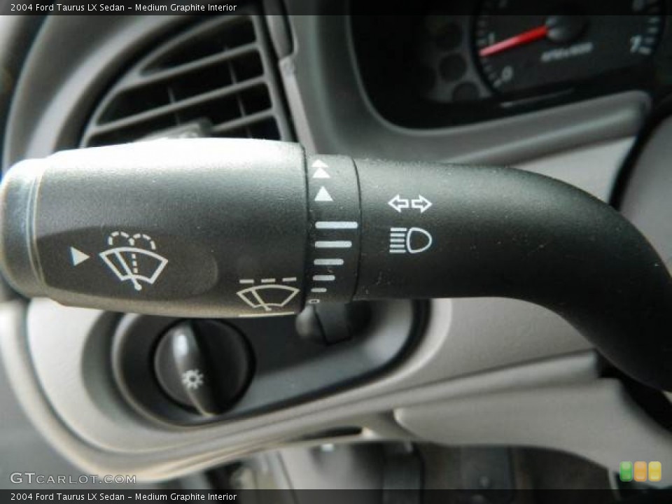 Medium Graphite Interior Controls for the 2004 Ford Taurus LX Sedan #77363499