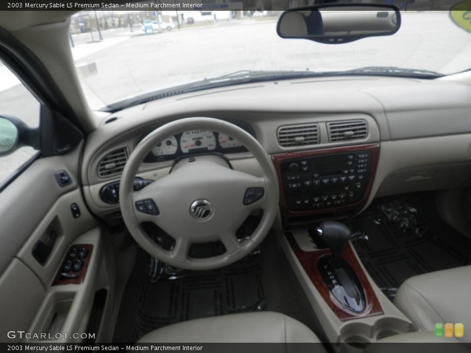 Medium Parchment Interior Dashboard for the 2003 Mercury Sable LS Premium Sedan #77371044