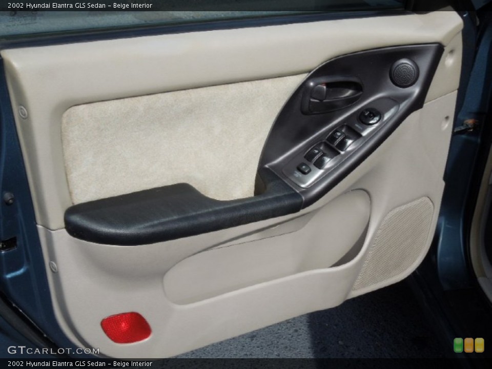 Beige Interior Door Panel for the 2002 Hyundai Elantra GLS Sedan #77382467