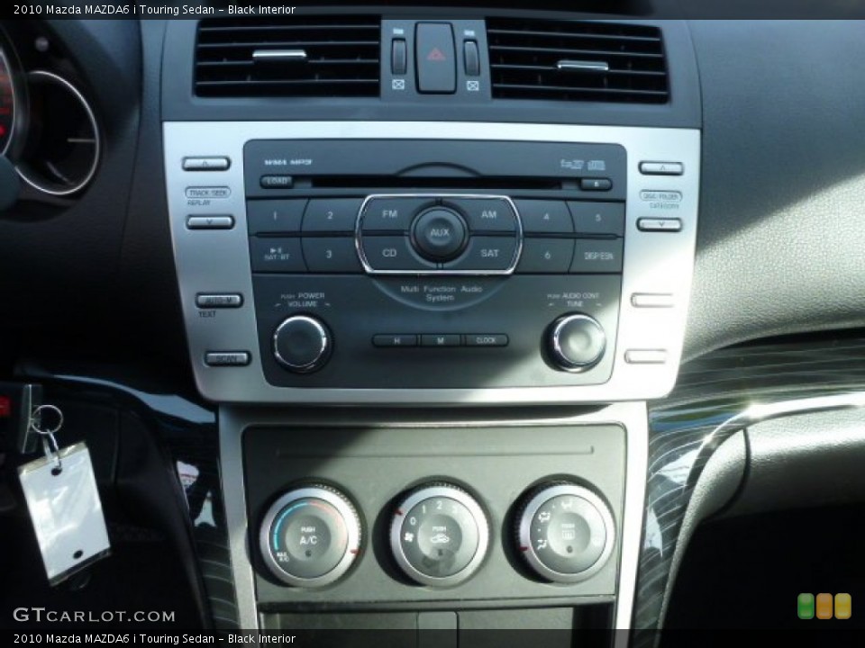 Black Interior Controls for the 2010 Mazda MAZDA6 i Touring Sedan #77383044