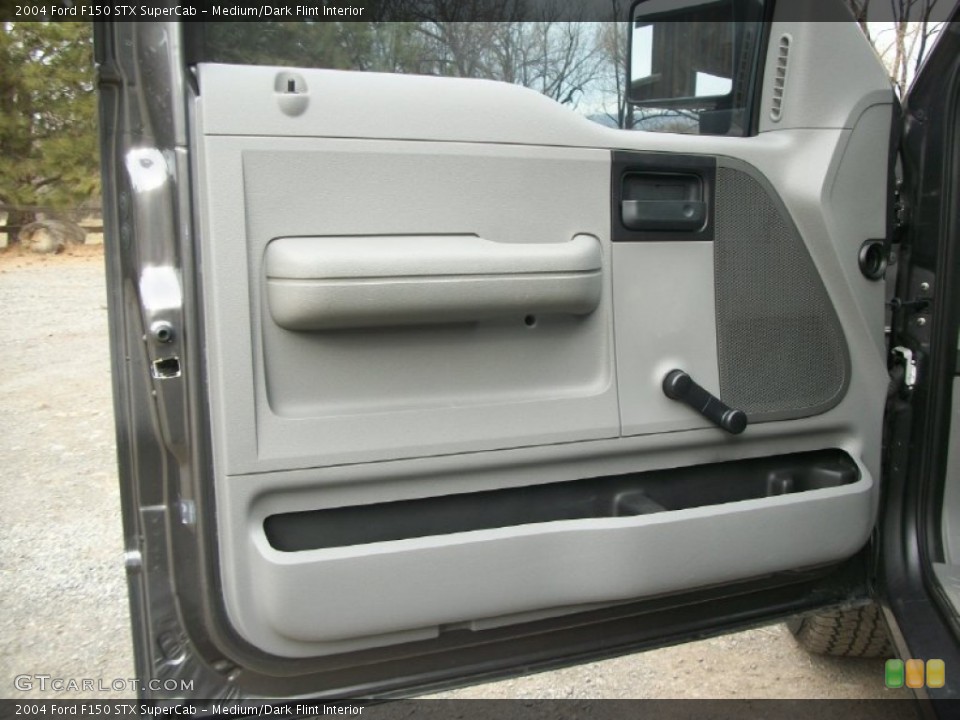Medium/Dark Flint Interior Door Panel for the 2004 Ford F150 STX SuperCab #77383908