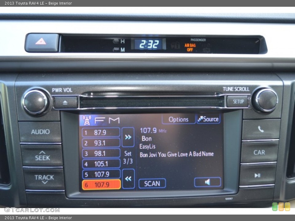 Beige Interior Controls for the 2013 Toyota RAV4 LE #77387915