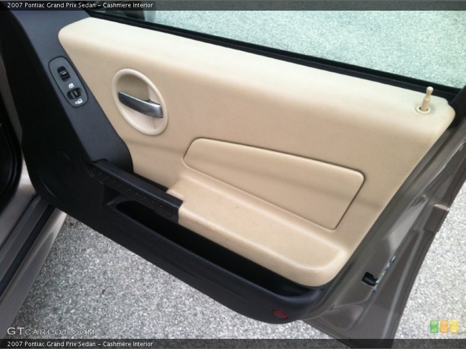 Cashmere Interior Door Panel for the 2007 Pontiac Grand Prix Sedan #77388804