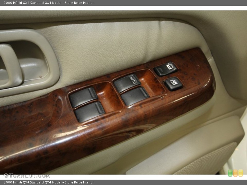 Stone Beige Interior Controls for the 2000 Infiniti QX4  #77406091