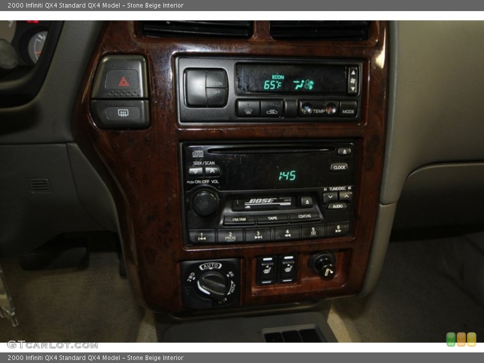 Stone Beige Interior Controls for the 2000 Infiniti QX4  #77406161