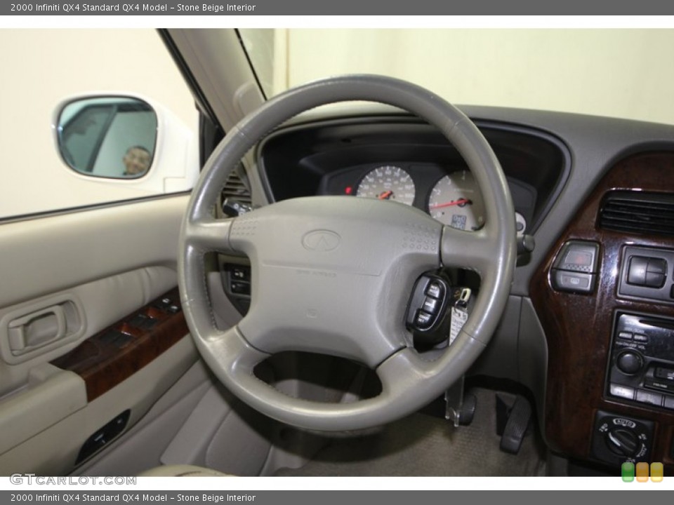 Stone Beige Interior Steering Wheel for the 2000 Infiniti QX4  #77406319