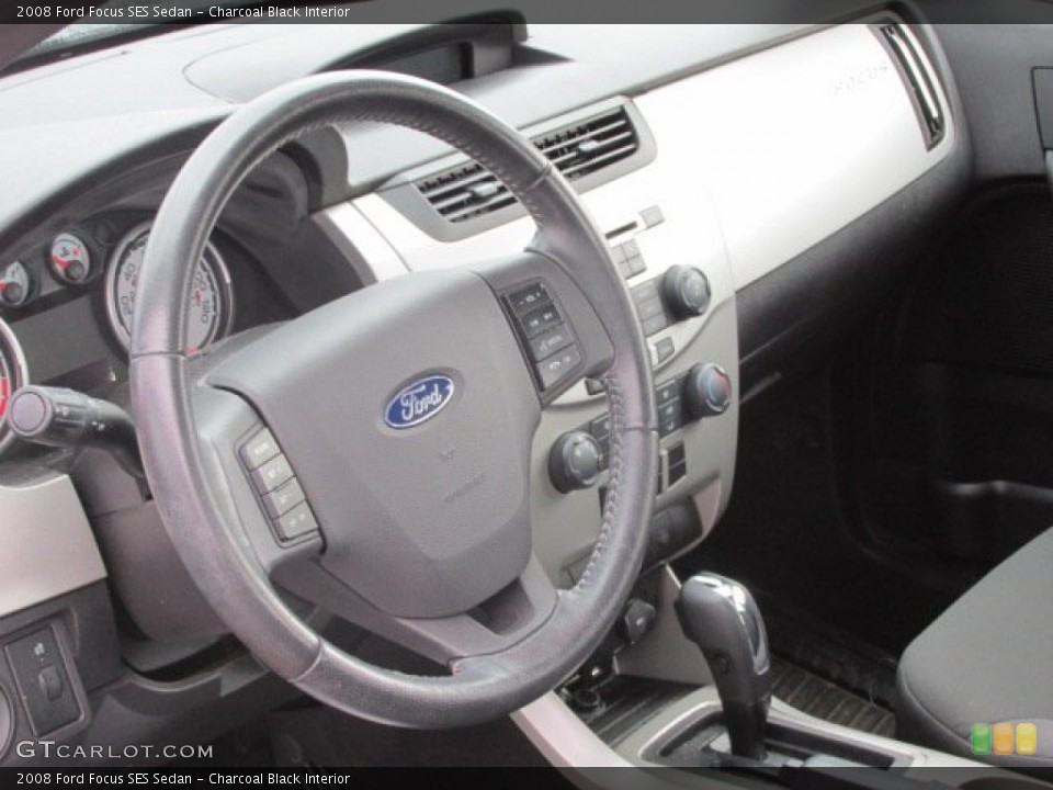 Charcoal Black Interior Steering Wheel for the 2008 Ford Focus SES Sedan #77430662