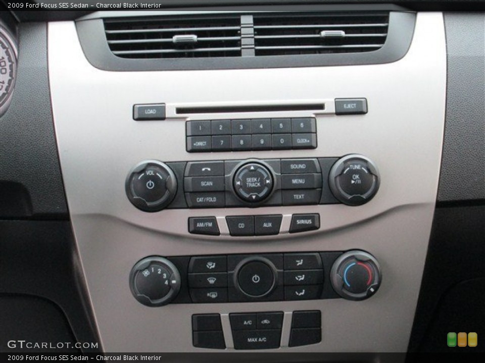 Charcoal Black Interior Controls for the 2009 Ford Focus SES Sedan #77435523