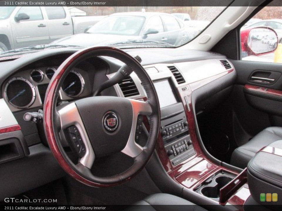 Ebony/Ebony Interior Dashboard for the 2011 Cadillac Escalade Luxury AWD #77439615