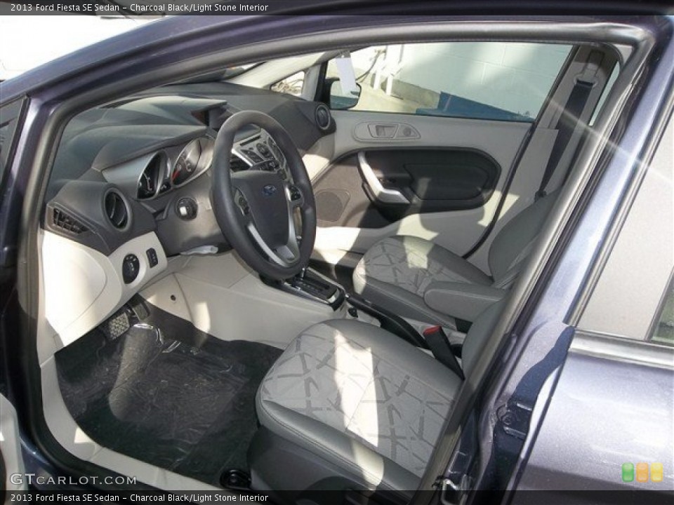 Charcoal Black/Light Stone Interior Photo for the 2013 Ford Fiesta SE Sedan #77439917
