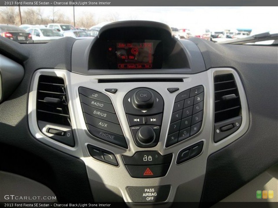 Charcoal Black/Light Stone Interior Controls for the 2013 Ford Fiesta SE Sedan #77439965