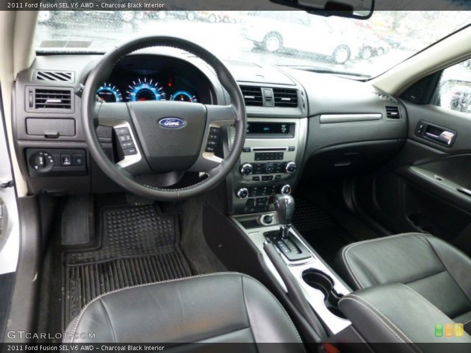 Charcoal Black Interior Prime Interior for the 2011 Ford Fusion SEL V6 AWD #77449125