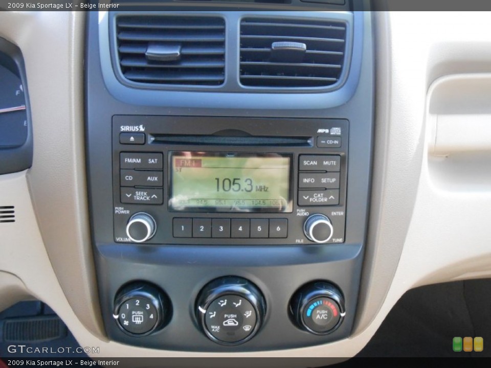 Beige Interior Controls for the 2009 Kia Sportage LX #77457696