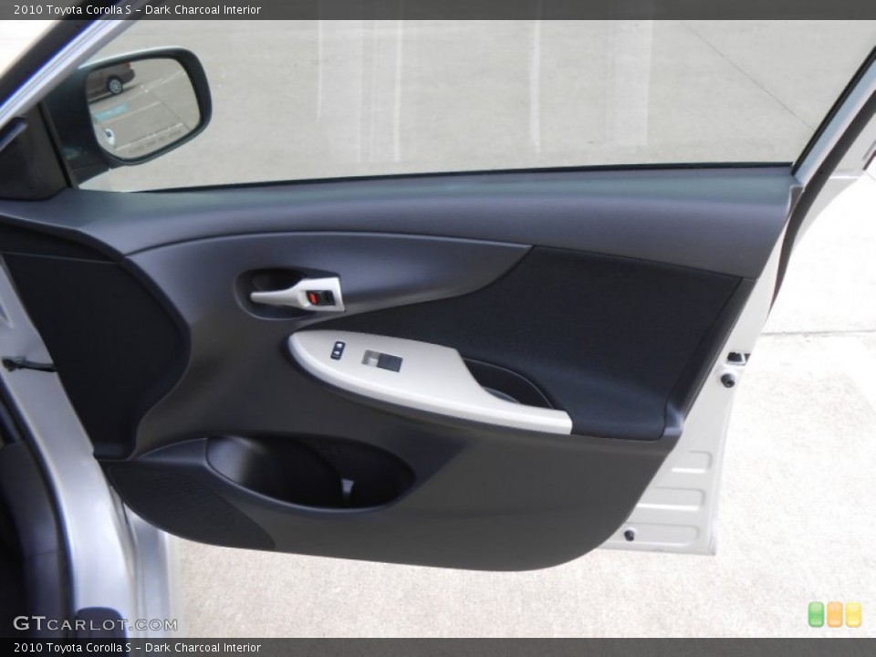 Dark Charcoal Interior Door Panel for the 2010 Toyota Corolla S #77465016