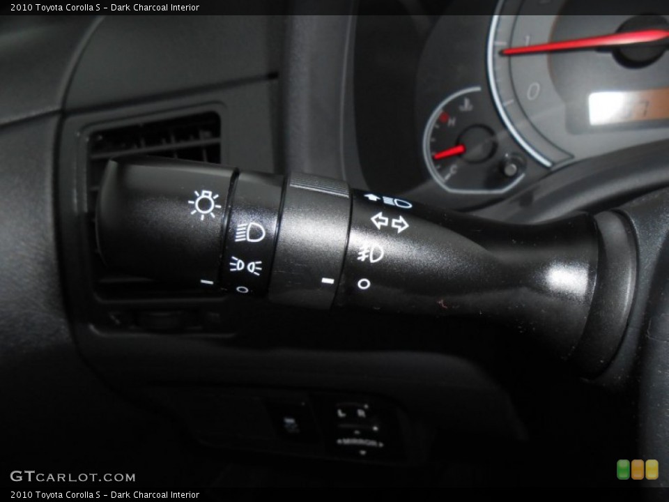 Dark Charcoal Interior Controls for the 2010 Toyota Corolla S #77465221
