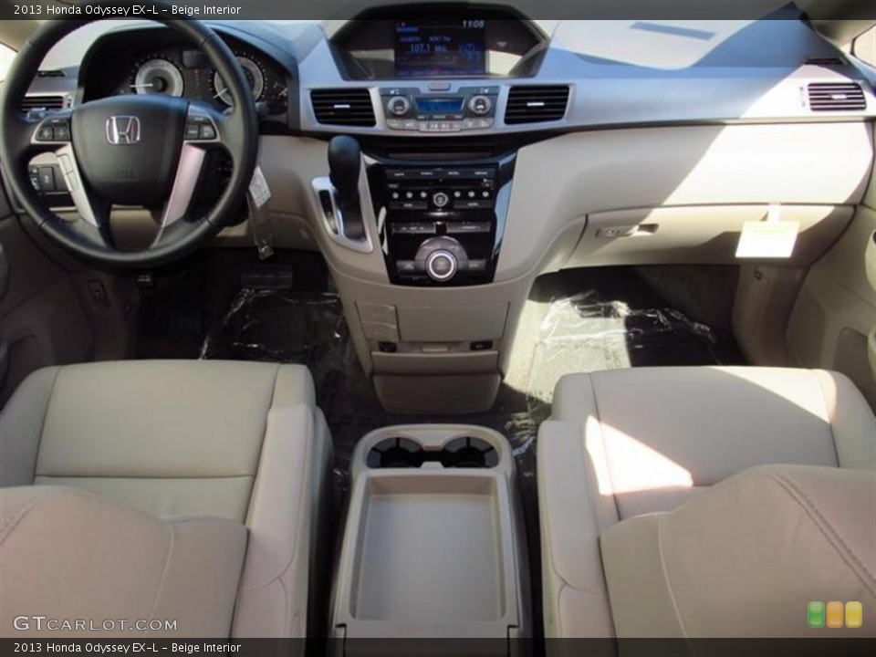 Beige Interior Dashboard for the 2013 Honda Odyssey EX-L #77465580