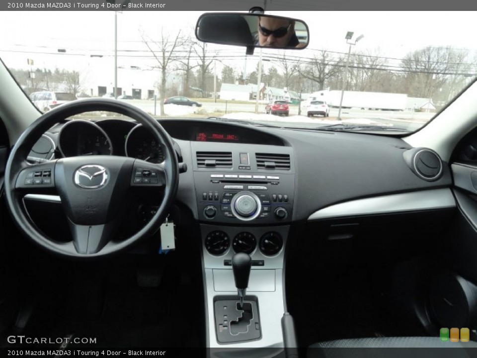 Black Interior Dashboard for the 2010 Mazda MAZDA3 i Touring 4 Door #77480126