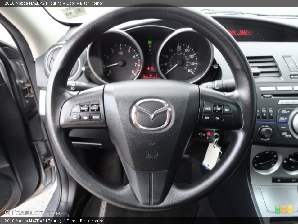 Black Interior Steering Wheel for the 2010 Mazda MAZDA3 i Touring 4 Door #77480150