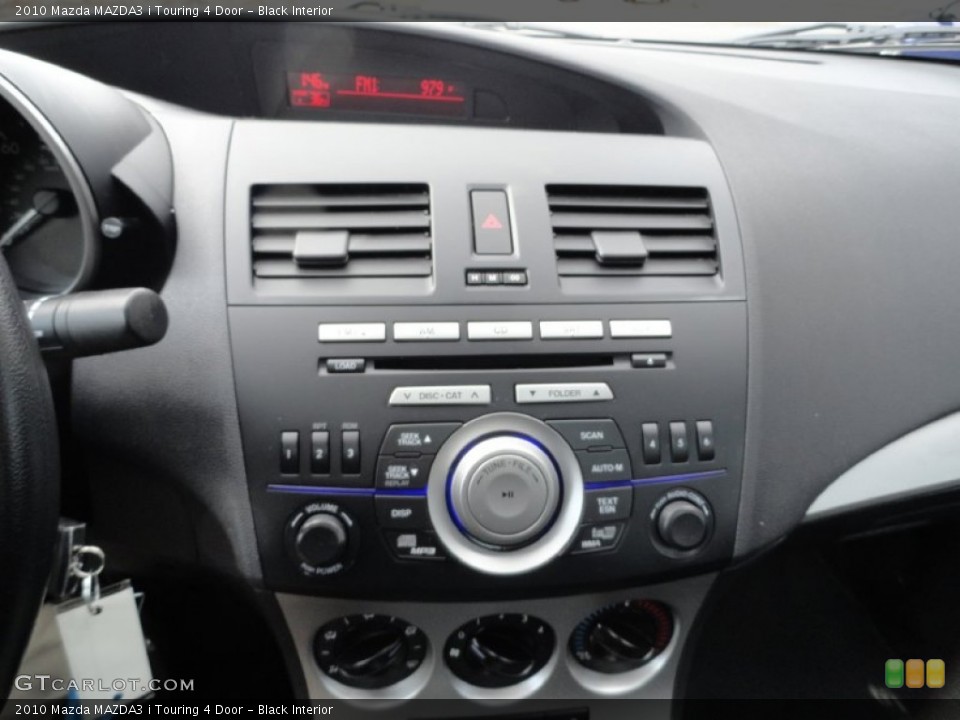 Black Interior Controls for the 2010 Mazda MAZDA3 i Touring 4 Door #77480267
