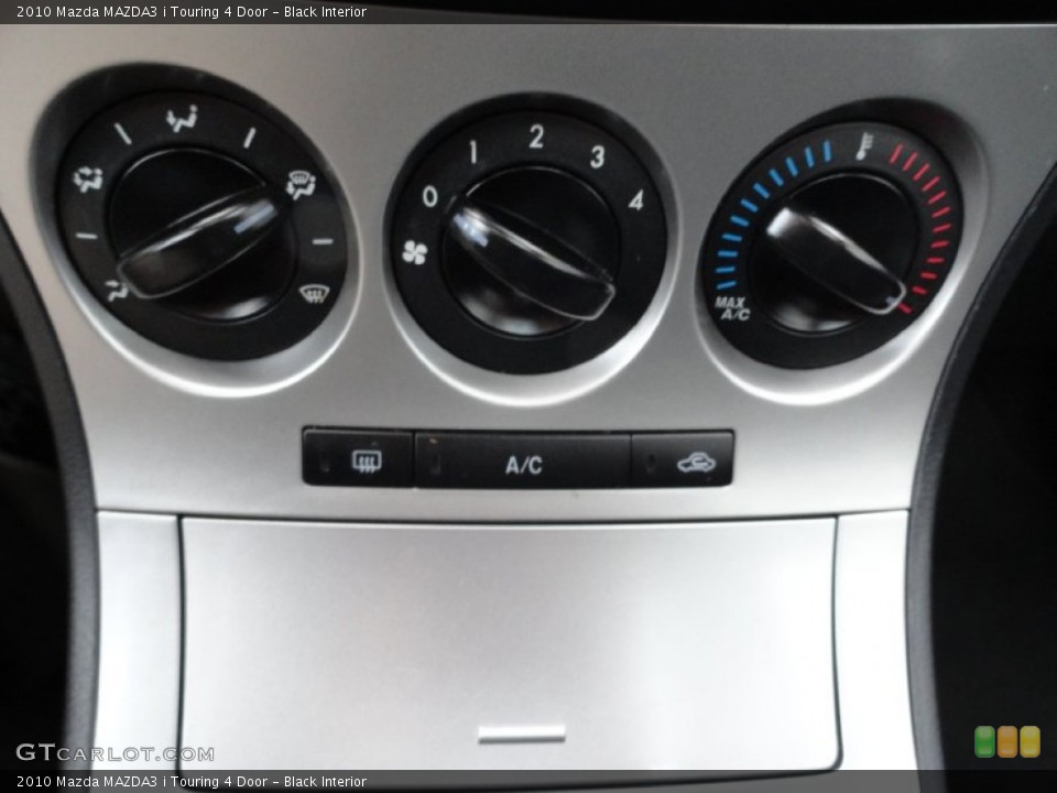 Black Interior Controls for the 2010 Mazda MAZDA3 i Touring 4 Door #77480372