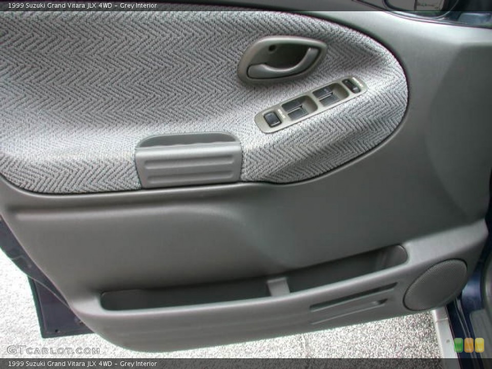 Grey Interior Door Panel for the 1999 Suzuki Grand Vitara JLX 4WD #77500640